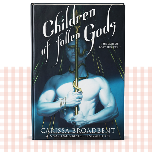 Hardback book cover of 'Children of Fallen Gods' by Carissa Broadbent with a blue and gold fantasy design.
