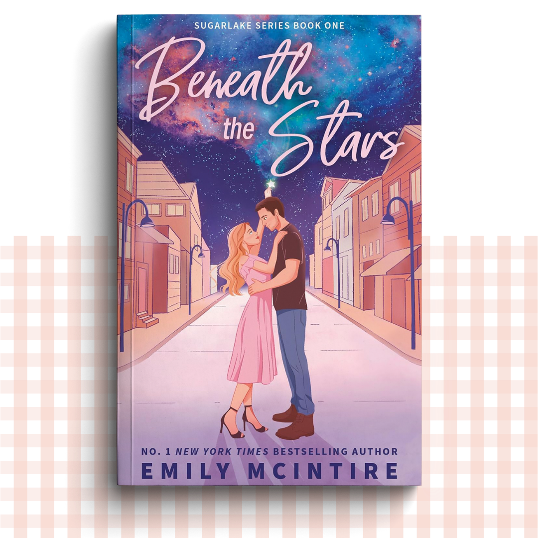 Paperback book cover of 'Beneath the Stars' by Emily McIntire with a couple embracing under a starry sky.