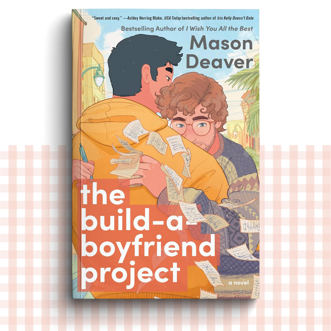 Paperback book cover of 'The Build-A-Boyfriend Project' by Mason Deaver with two men hugging on the front.