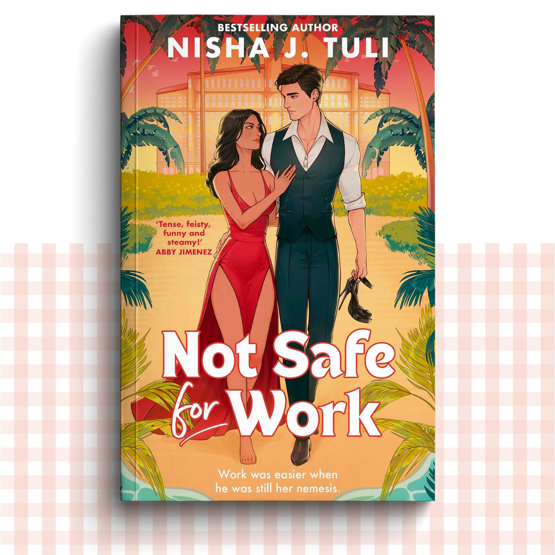 Paperback book cover of 'Not Safe for Work' by Nisha J. Tuli with a couple in a tropical setting.