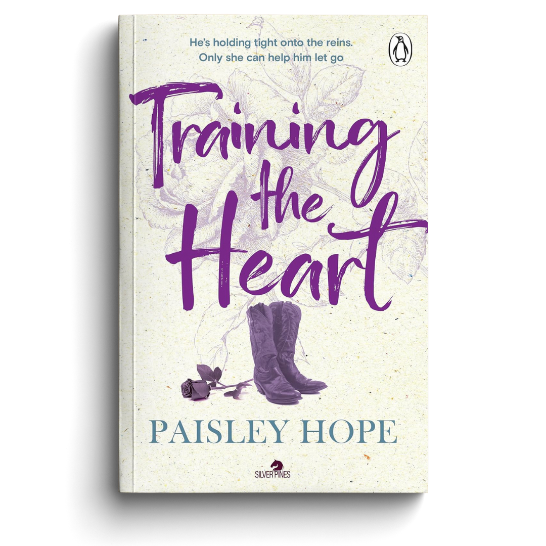 Book cover of 'Training the Heart' by Paisley Hope with purple text and boots on a white background
