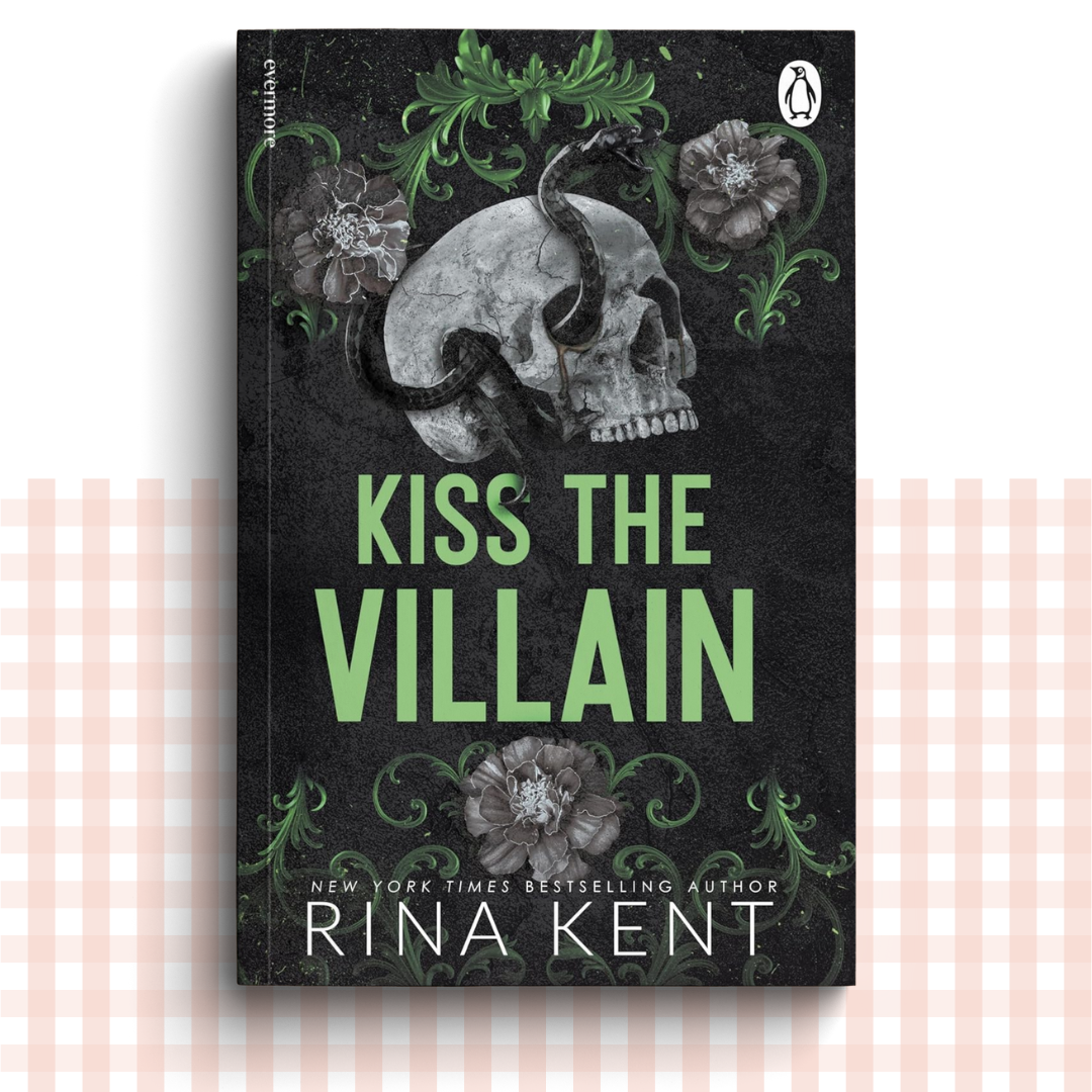 Paperback book cover of 'Kiss the Villain' with a skull and floral design on a dark background.
