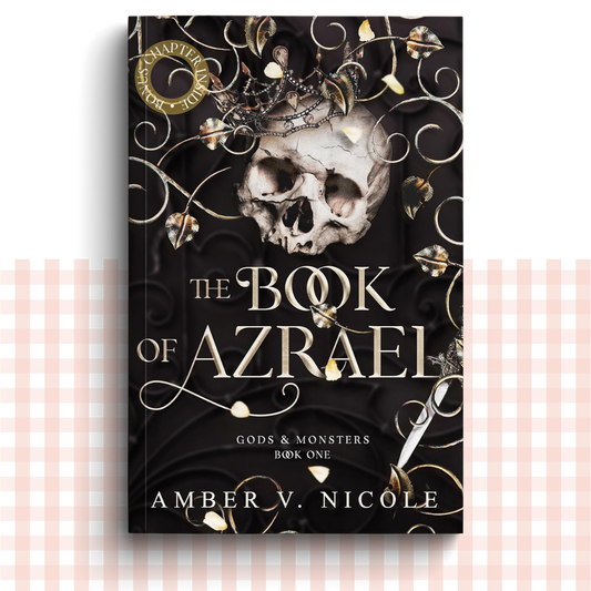 Paperback book cover of 'The Book of Azrael' with a skull and decorative elements on a dark background.