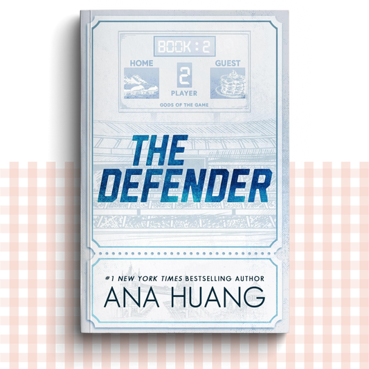 Paperback book cover of 'The Defender' by Ana Huang with a blue design