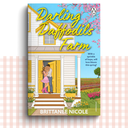 Paperback book cover of 'Darling Daffodils Farm' by Brittanée Nicole with a couple embracing on a porch.