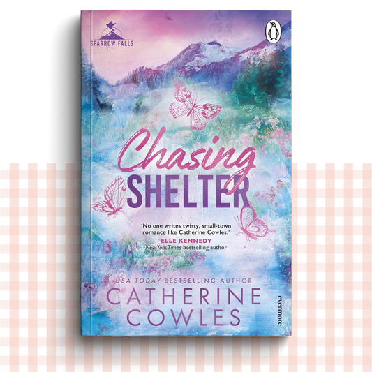 Paperback book cover of 'Chasing Shelter' by Catherine Cowles with a colourful landscape and butterfly design.