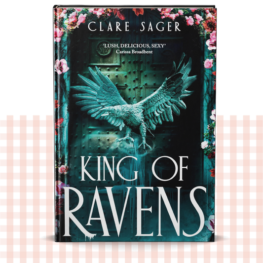 Hardback book cover of 'King of Ravens' by Clare Sager with an eagle and floral design