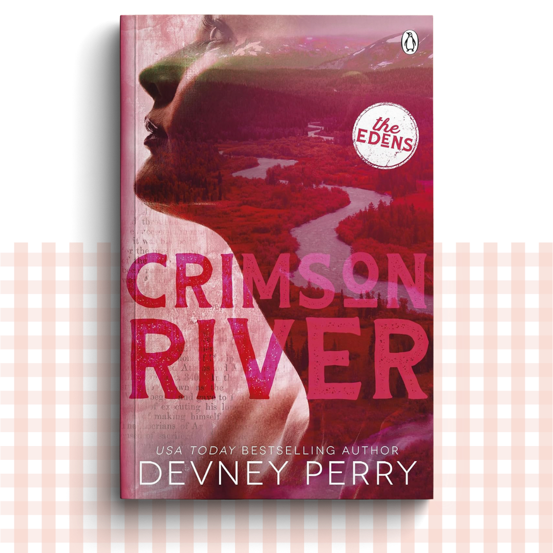 Paperback book cover of 'Crimson River' by Devney Perry with a pink and red color scheme.