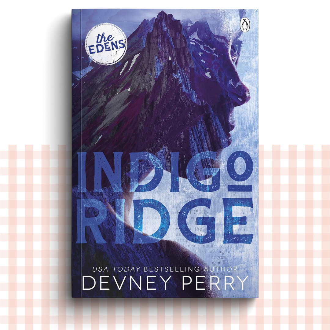 Paperback book cover of 'Indigo Ridge' by Devney Perry with a deep blue design.