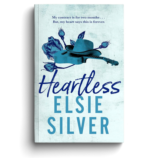 Book cover of 'Heartless' by Elsie Silver with a blue hat, roses, and guitar on a light blue background.