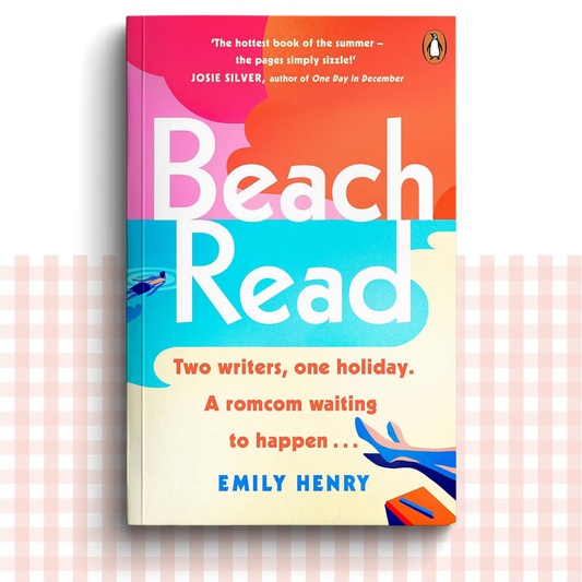 Paperback book cover of 'Beach Read' by Emily Henry with a colourful beach design.