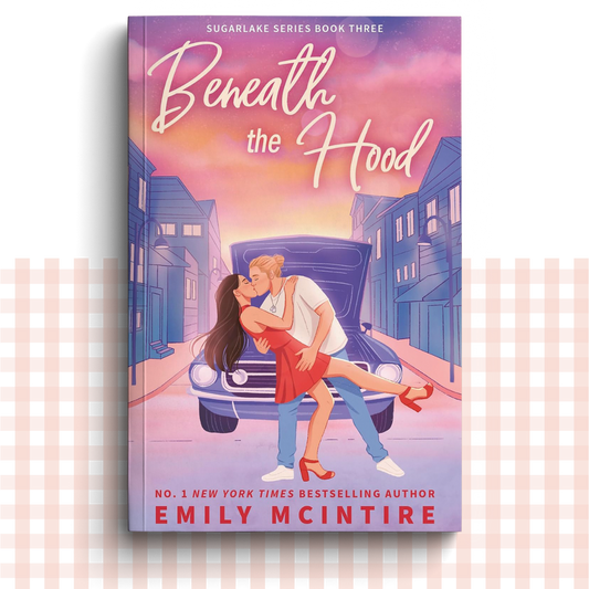 Paperback book cover of 'Beneath the Hood' by Emily McIntire with a couple embracing in front of a car.