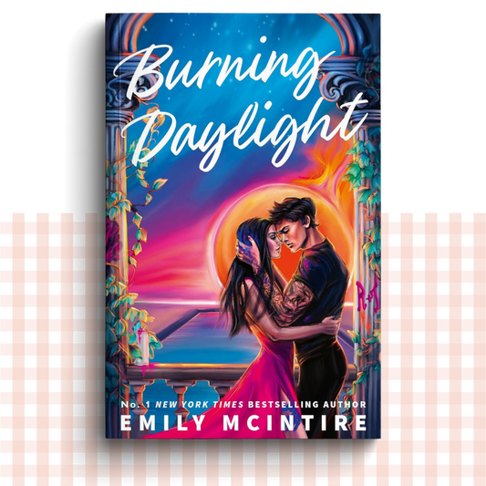 Paperback book cover of 'Burning Daylight' by Emily McIntire with a couple embracing against a colourful background.