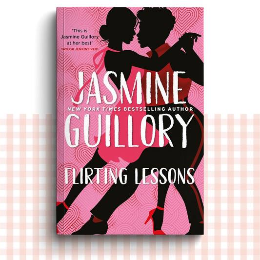 Paperback book cover of 'Flirting Lessons' by Jasmine Guillory with a pink background featuring a Sapphic couple danncing.