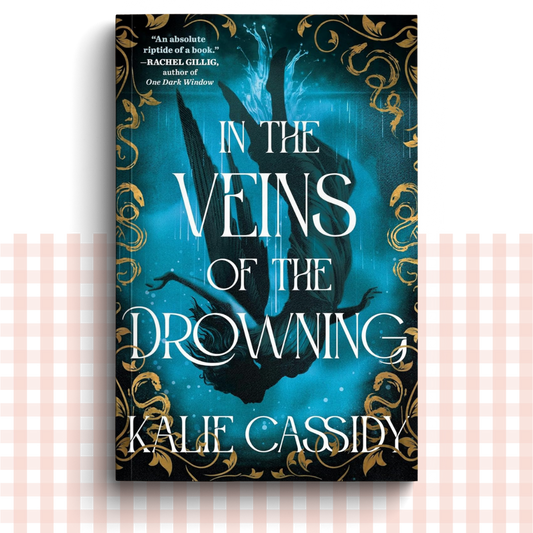Paperback book cover of 'In the Veins of the Drowning' by Kalie Cassidy with a blue and gold fantasy design.