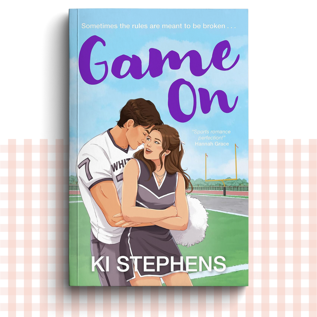Paperback book cover of 'Game On' by Ki Stephens with a couple on a sports field.