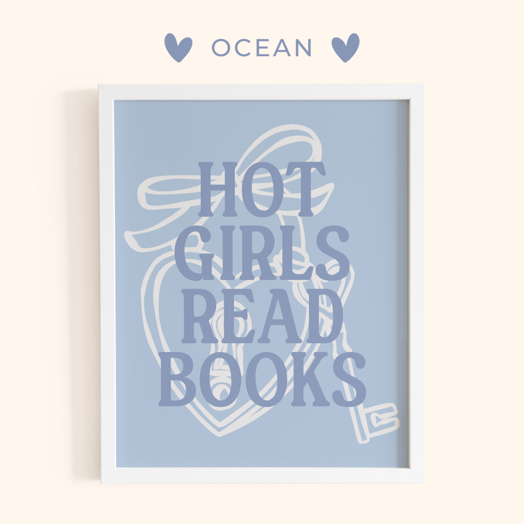 Framed artwork with 'HOT GIRLS READ BOOKS' text on a light blue background, branded 'Ocean'