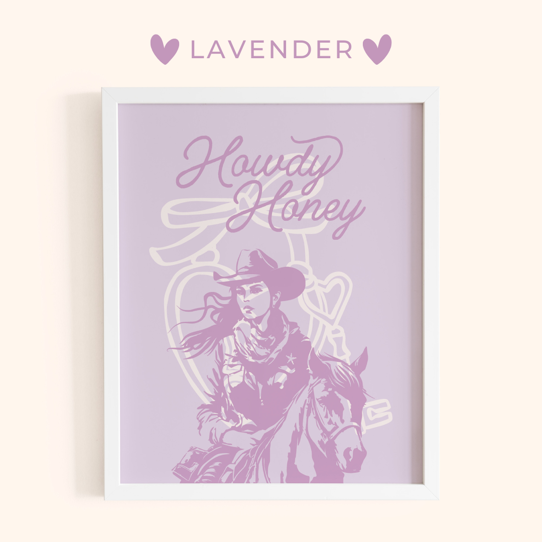 Framed artwork with a cowboy silhouette and 'Howdy Honey' text on a lavender background.