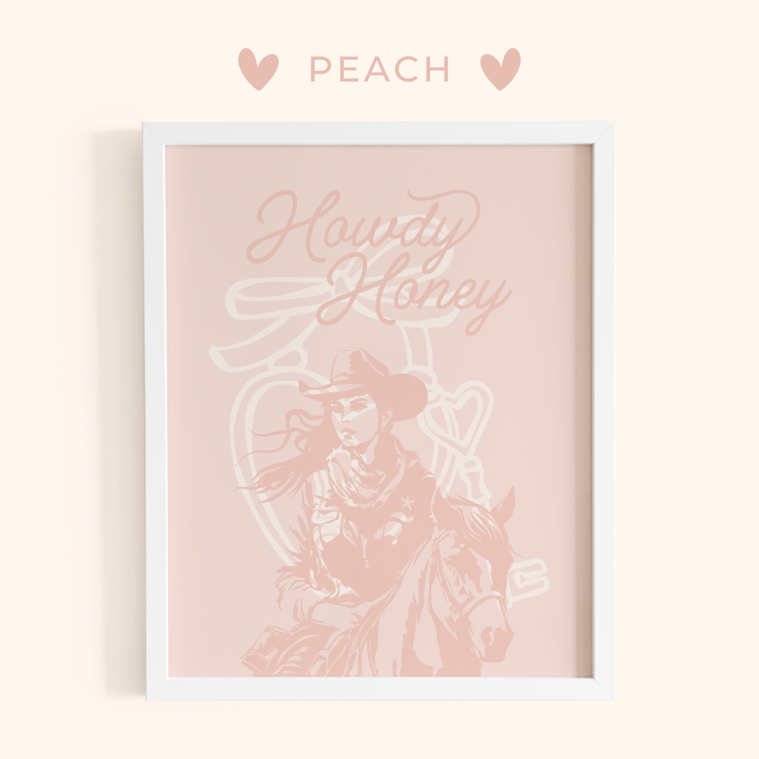 Framed artwork with 'Howdy Honey' text and a cowgirl illustration on a peach background.