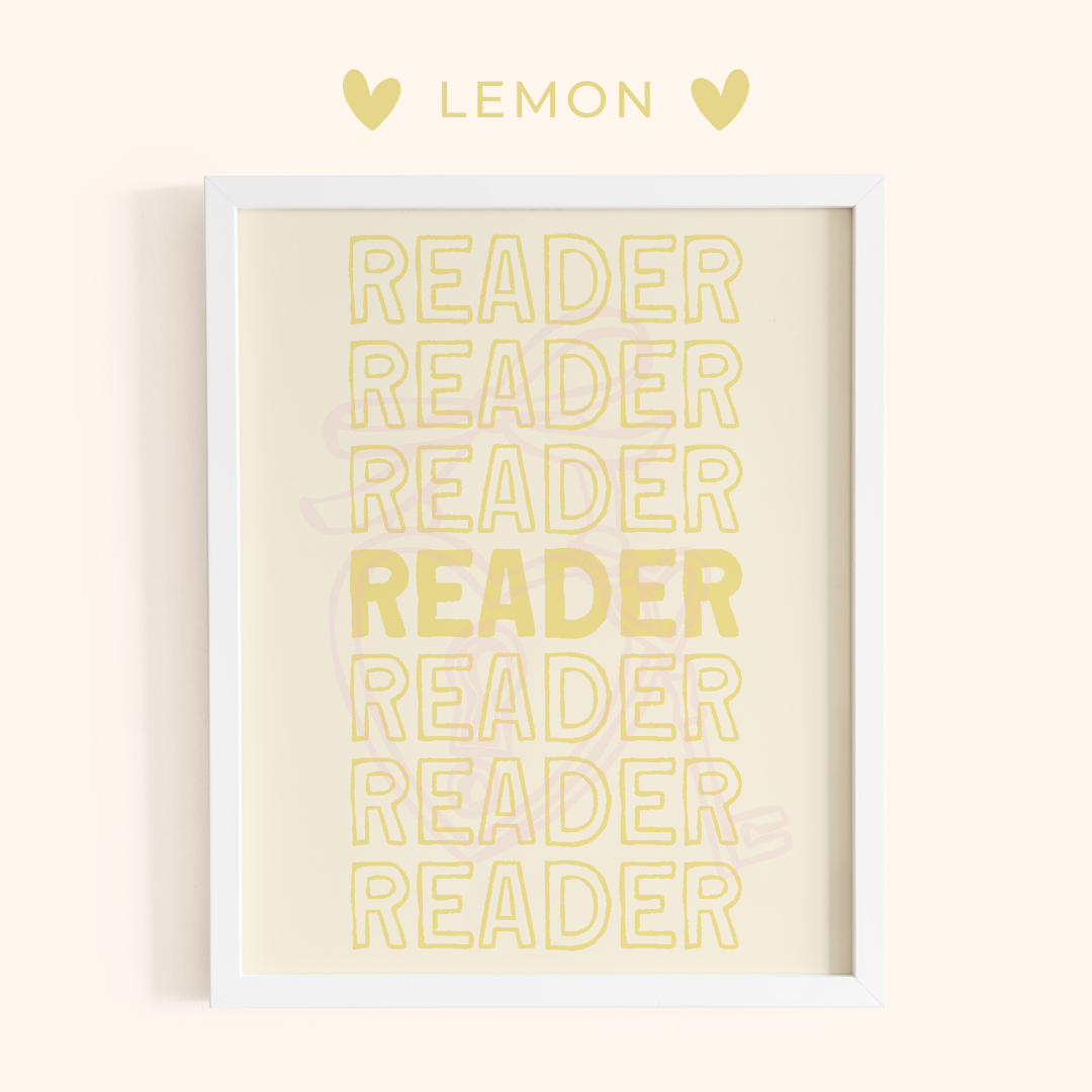 Framed artwork with 'READER' text in lemon on a light yellow background