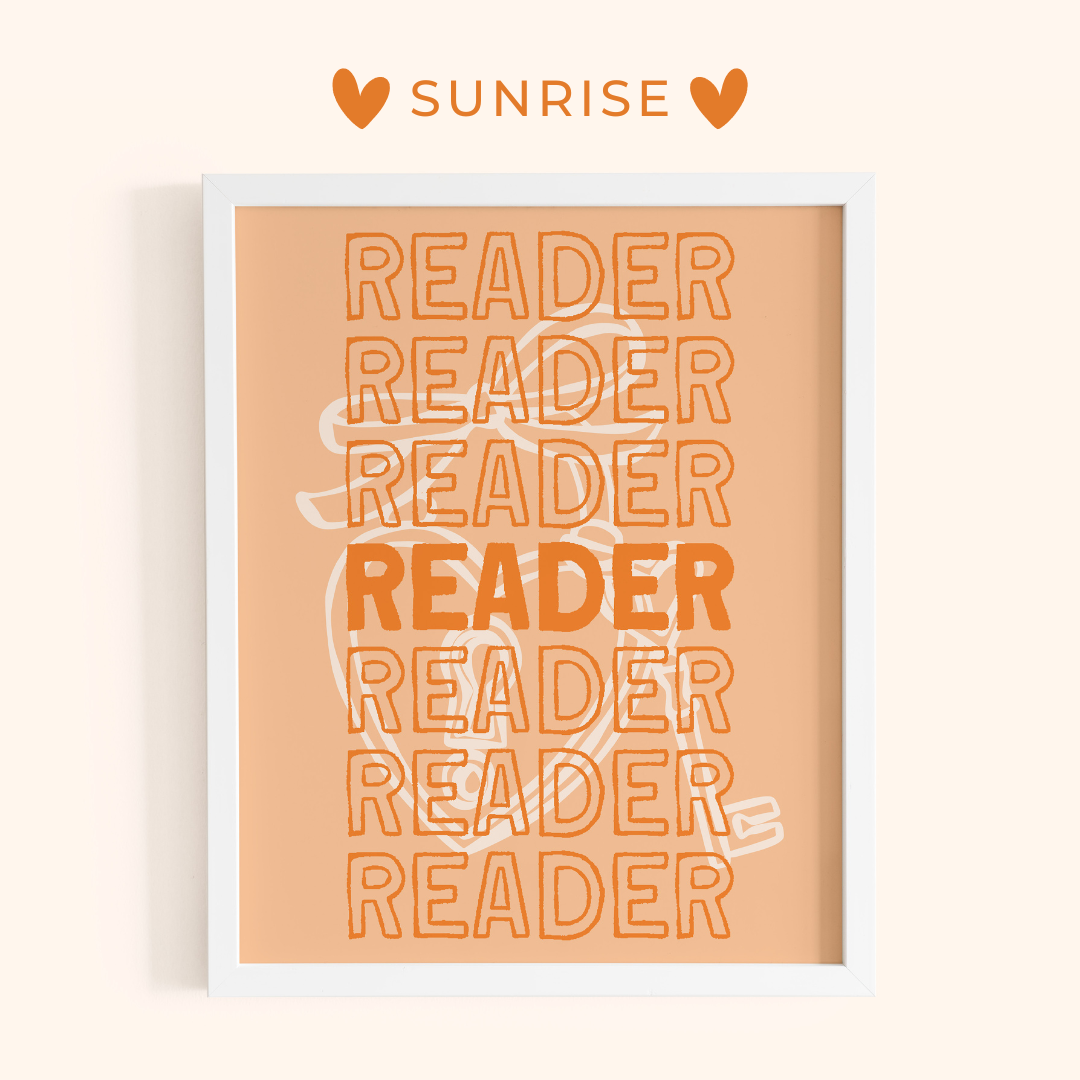 Framed poster with 'READER' text and 'SUNRISE' branding on a peach background