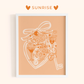 Framed artwork with romantic illustrations on a peach background, featuring the brand 'Sunrise'.