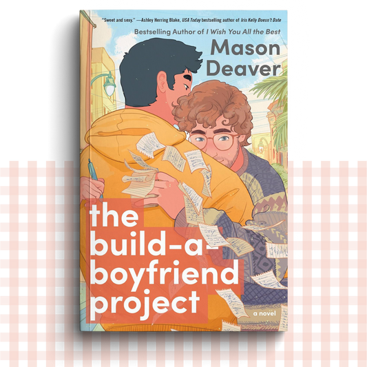 Paperback book cover of 'The Build-A-Boyfriend Project' by Mason Deaver with two men hugging on the front.