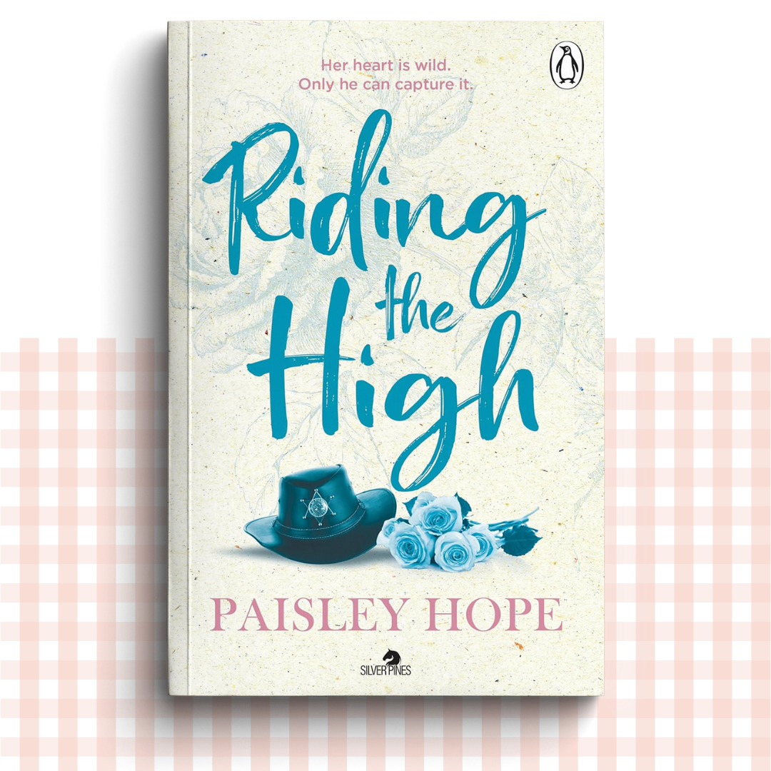 Paperback book cover of 'Riding the High' by Paisley Hope with a blue and cream design and a blue sheriff's hat.
